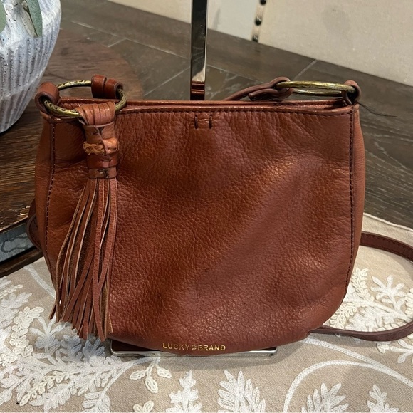 Lucky Brand Jade Leather Hobo Crossbody Bag with Tassel Accent - Picture 1 of 9